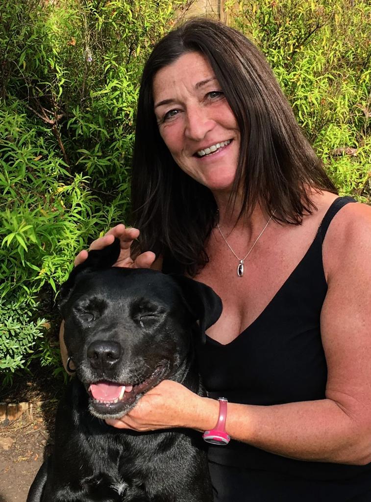 Suzi with a black dog called Lemi